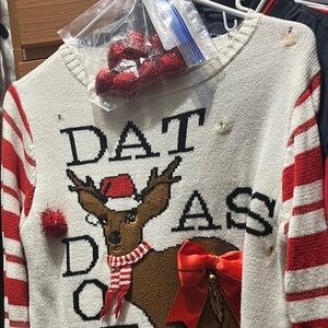 Holiday Reindeer Sweater with Red Bow and Striped Sleeves